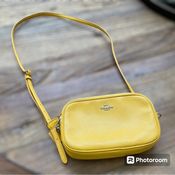 Coach Handbags - Bright Yellow Coach cross body. Two zippered compartments.